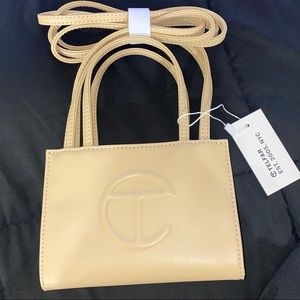 selling cream telfar mini !!